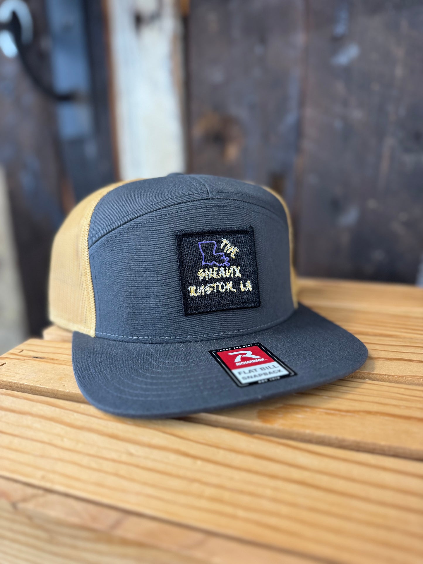 THE SHEAUX CAP-7 PANEL TRUCKER